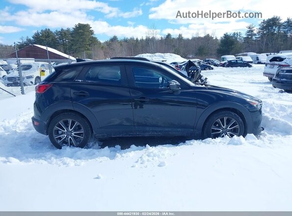 JM1DKFC76H0153629 2017 MAZDA CX-3 Black Widok wnętrza z tyłu
