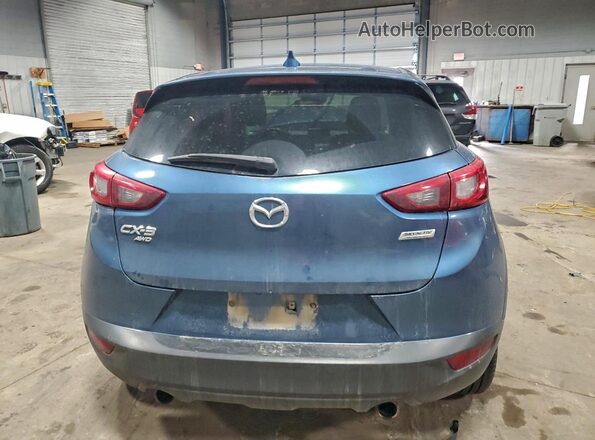 JM1DKFD77J0309875 2018 MAZDA CX-3 Синий Вид сзади