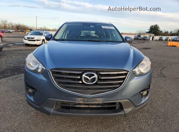 JM3KE4DY2G0664237 2016 MAZDA CX-5 Blue 360 interior view