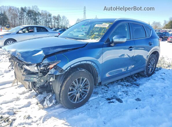 JM3KFACM2K1572882 2019 MAZDA CX-5 Blue Առջևի ձախ երեք քառորդ տեսարան