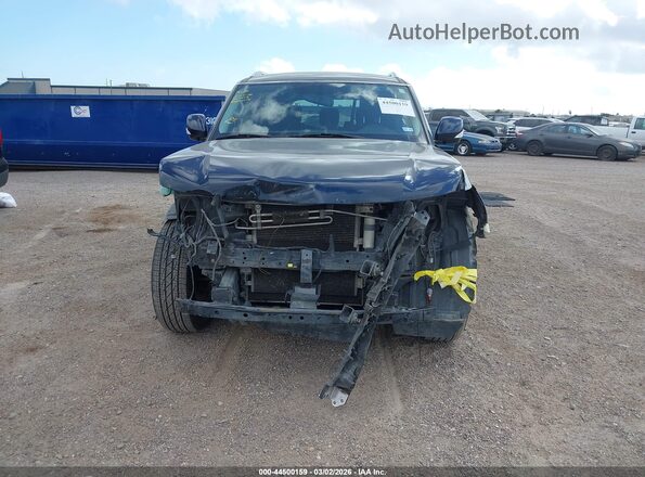 JN8AY2ND0KX010014 2019 NISSAN ARMADA Dark Blue Вид задней части салона