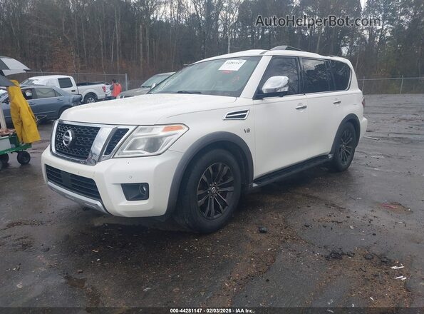 JN8AY2NE2H9706623 2017 NISSAN ARMADA White Vista tres cuartos delantera izquierda