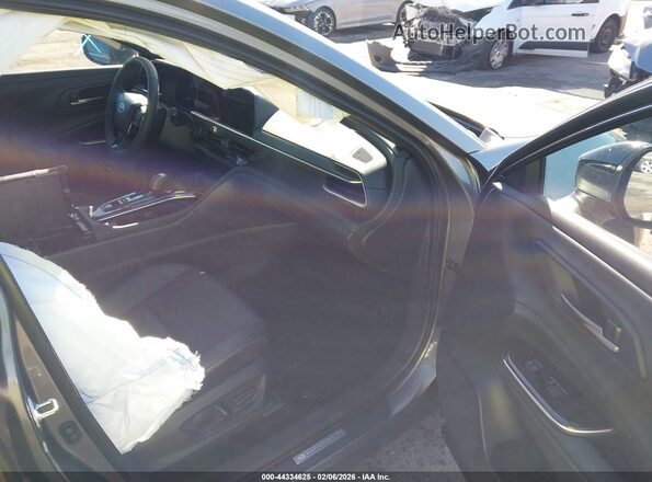 JTDAAAAF7T3044591 2026 TOYOTA LE Серый Вид салона спереди