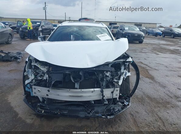 JTHU9JBH9K2013416 2019 LEXUS UX 250H Белый Вид панели приборов