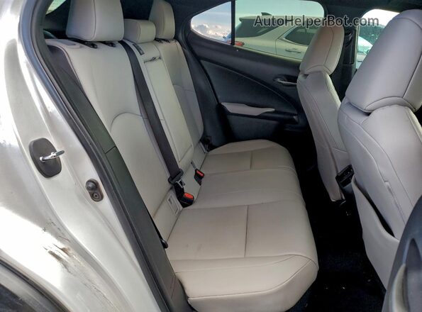 JTHX9JBH2N2062216 2022 LEXUS UX White Vista de los asientos traseros