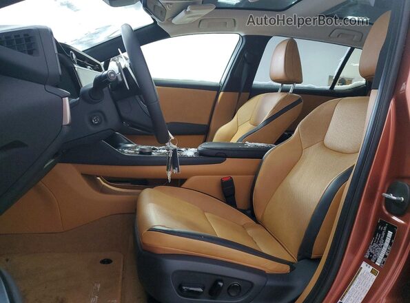 JTJABABB0SA010735 2025 LEXUS RZ Желто-коричневый Вид салона спереди