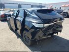 2026 Lexus Rx 450h+ Premium Black vin: JTJCJMGA6T2039276