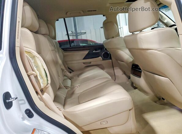 JTJDY7AX9L4325299 2020 LEXUS LX White Rear interior view