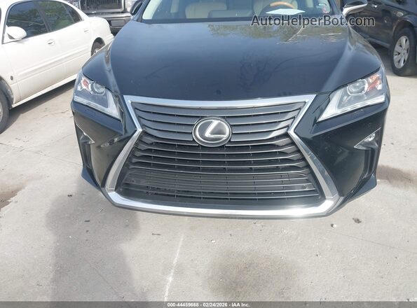 JTJDZKCA0J2010666 2018 LEXUS RX 350L  Вид спереди