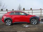2025 Subaru Solterra Limited Red vin: JTMABABA6SA094487