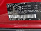 2025 Subaru Solterra Limited Red vin: JTMABABA6SA094487