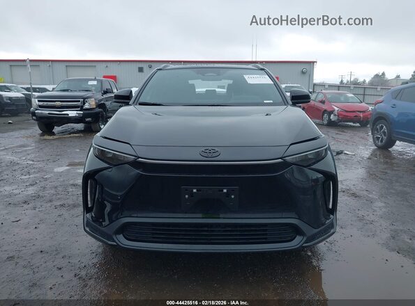 JTMABACA5SA104991 2025 TOYOTA BZ4X Black Вид задньої частини салону