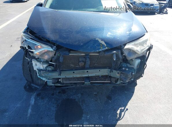 JTMBFREV2HJ709809 2017 TOYOTA LE Green Front view