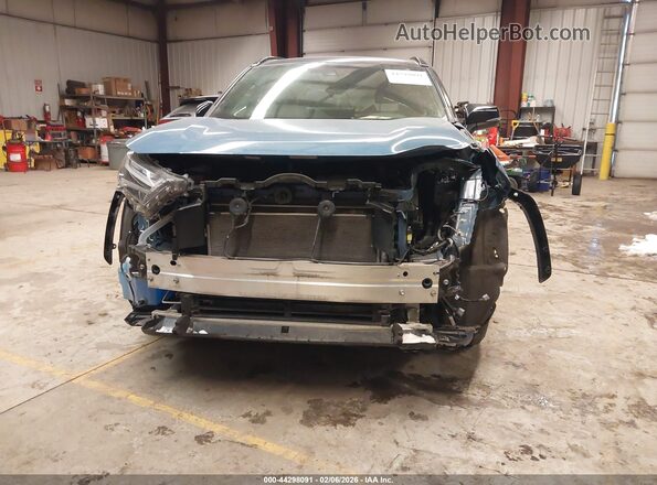 JTME6RFV6PD536837 2023 TOYOTA RAV4 HYBRID Blue Вид задньої частини салону