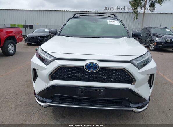 JTMEB3FVXRD209398 2024 TOYOTA RAV4 PRIME Белый Вид задней части салона