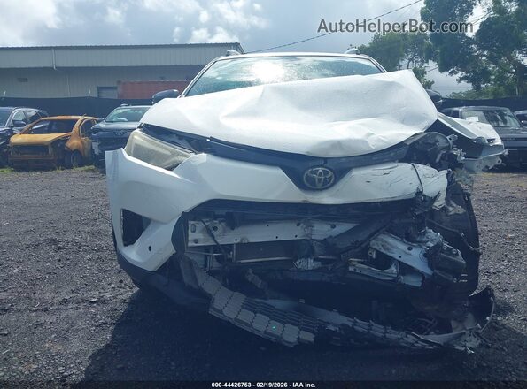 JTMJFREV3GJ068812 2016 TOYOTA RAV4 White Սարքավորումների վահանակի տեսք