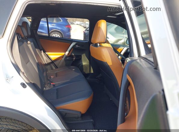 JTMJFREV4GD189279 2016 TOYOTA RAV4 White Widok naklejki z numerem VIN