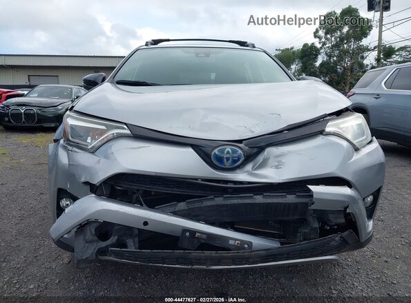 JTMJJREV5JD169337 2018 TOYOTA RAV4 HYBRID Silver Widok z przodu