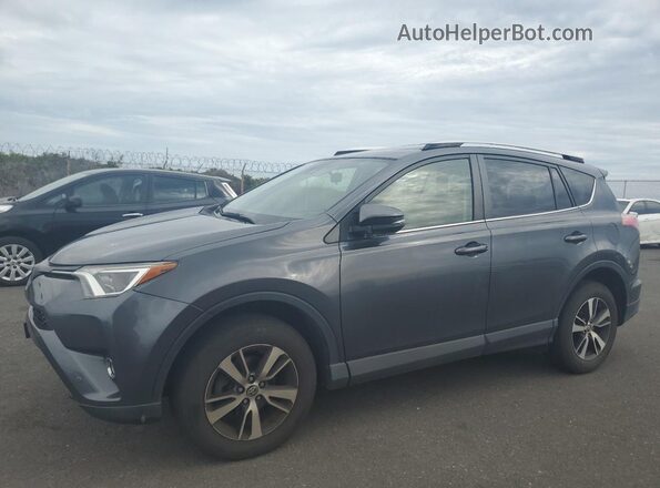 JTMWFREV9GD087384 2016 TOYOTA LE Charcoal Przód lewy