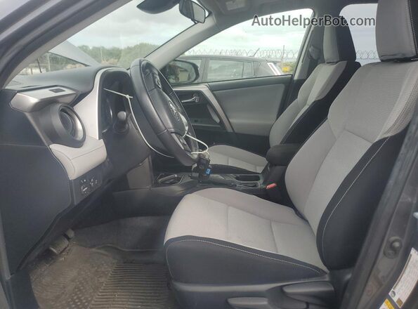 JTMWFREV9GD087384 2016 TOYOTA LE Charcoal Widok wnętrza z przodu