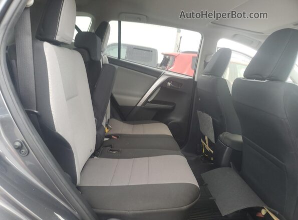 JTMWFREV9GD087384 2016 TOYOTA LE Charcoal Widok wnętrza z tyłu