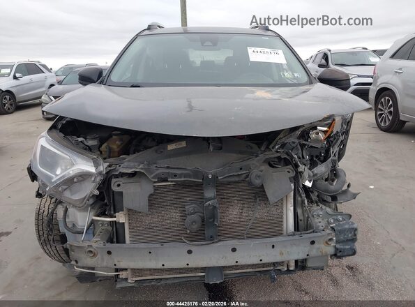 JTMZFREV4JJ751077 2018 TOYOTA LE Gray Vista interior trasera