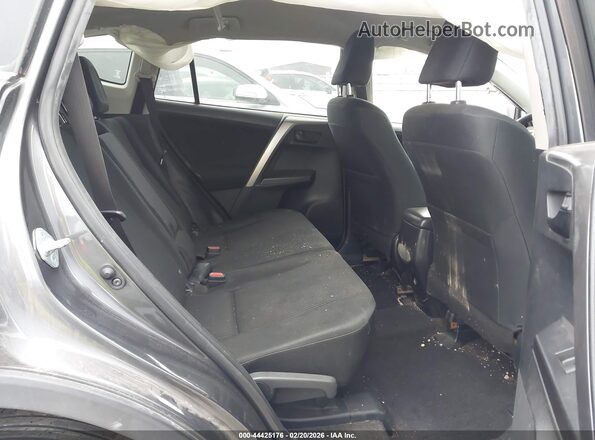 JTMZFREV4JJ751077 2018 TOYOTA LE Gray Vista de la etiqueta del VIN
