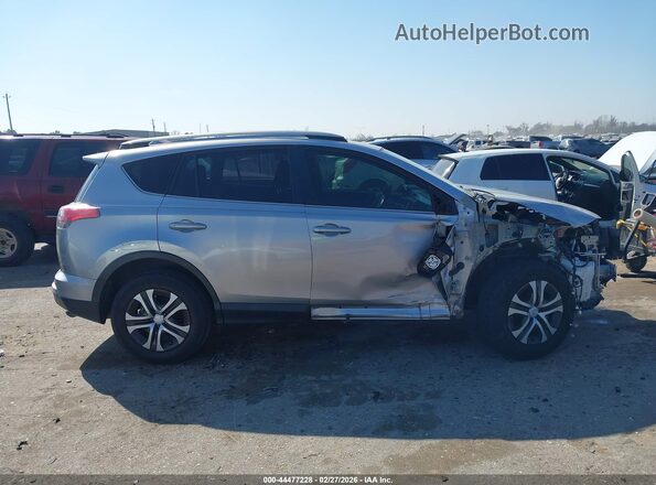 JTMZFREV5JJ185415 2018 TOYOTA LE Silver Vista interior trasera