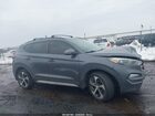 2018 Hyundai Tucson Value Gray vin: KM8J3CA28JU762009 2018 Hyundai Tucson Value Gray vin: KM8J3CA28JU762009