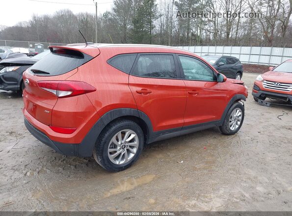 KM8J3CA41GU094337 2016 HYUNDAI TUCSON Оранжевый Задняя правая четверть