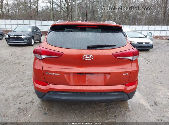 KM8J3CA41GU094337 2016 HYUNDAI TUCSON Оранжевый 