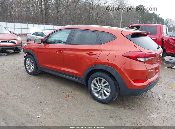 KM8J3CA41GU094337 2016 HYUNDAI TUCSON Оранжевый Задняя левая четверть