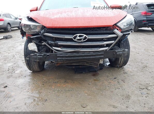 KM8J3CA41GU094337 2016 HYUNDAI TUCSON Оранжевый Вид спереди