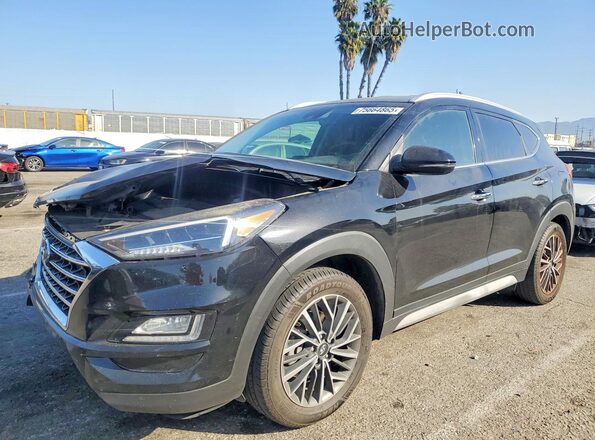 KM8J3CAL8KU972703 2019 HYUNDAI TUCSON Black Vista tres cuartos delantera izquierda