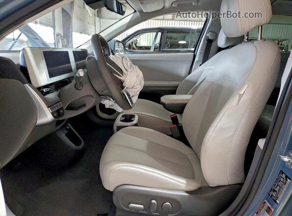 KM8KNDAF9PU192599 2023 HYUNDAI IONIQ Blue Вид салону спереду