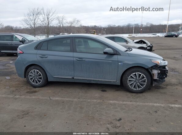 KMHC75LJXLU073993 2020 HYUNDAI IONIQ ELECTRIC Turquoise Widok wnętrza z tyłu