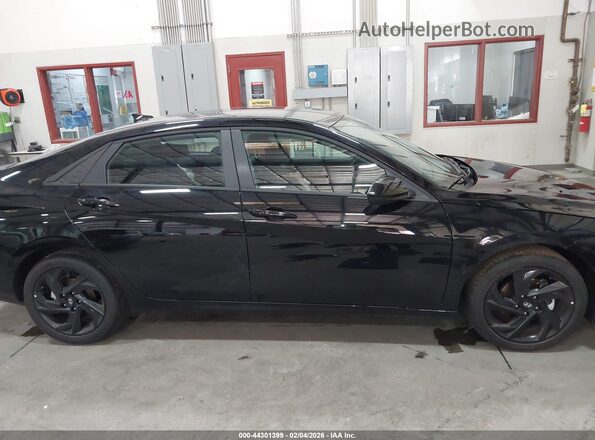KMHLM4DG7TU112481 2026 HYUNDAI ELANTRA Черный Вид задней части салона