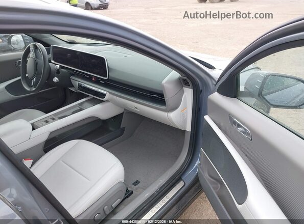 KMHM54AC9SA086565 2025 HYUNDAI IONIQ 6 Gray Vista interior delantera