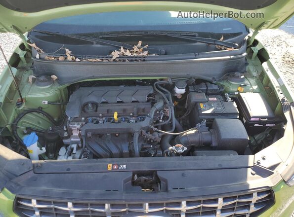 KMHRC8A32RU301487 2024 HYUNDAI VENUE Зеленый Вид задней части салона