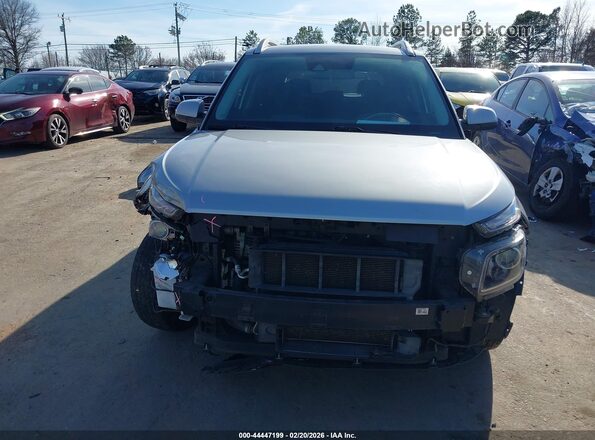 KMHRC8A37LU015738 2020 HYUNDAI VENUE Серебряный Вид задней части салона