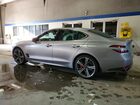 2024 Genesis G70 Base Серебряный vin: KMTG34SC2RU136674
