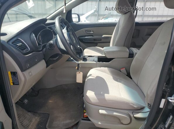 KNDMA5C17G6184554 2016 KIA SEDONA Черный Вид салона спереди
