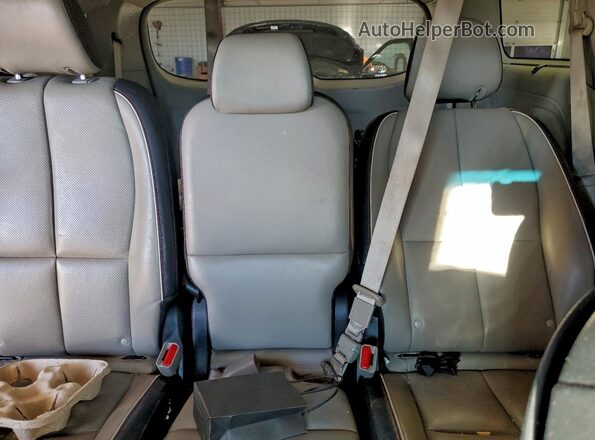 KNDMB5C18M6672467 2021 KIA SEDONA Silver Rear seats view