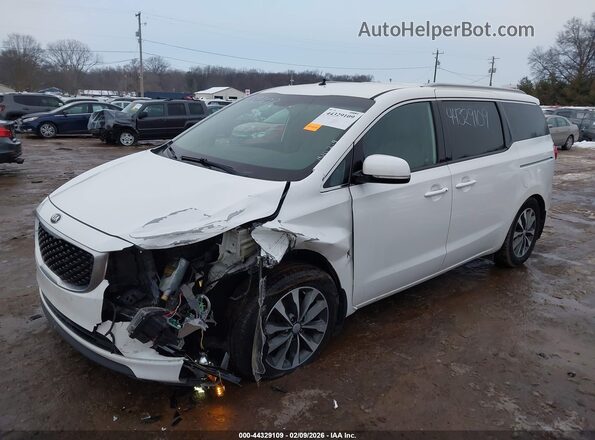 KNDMC5C13H6327883 2017 KIA SEDONA Белый Вид спереди