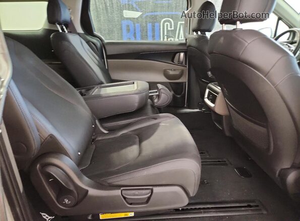 KNDNB5KA3T6120301 2026 KIA CARNIVAL Белый Вид задней части салона