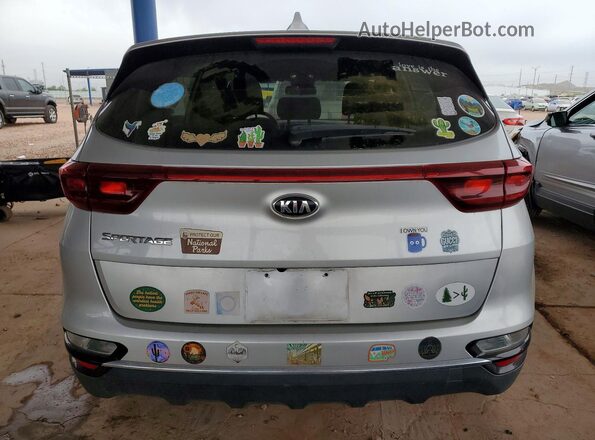 KNDPMCAC9M7915469 2021 KIA SPORTAGE Серебряный Вид сзади