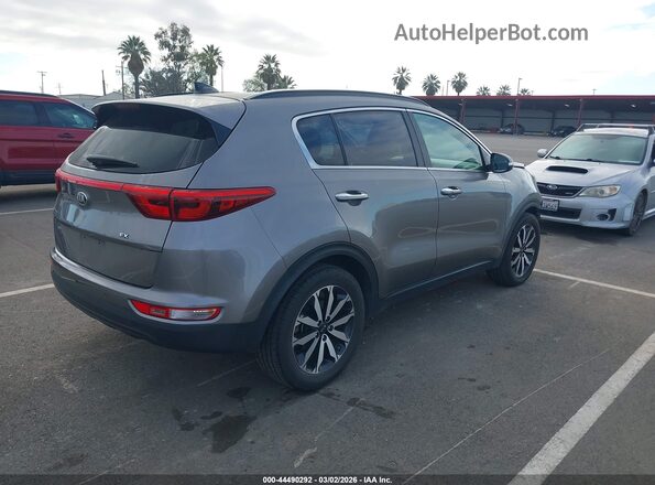 KNDPN3AC5K7512602 2019 KIA SPORTAGE Серебряный Задняя правая четверть