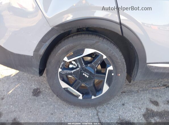 KNDPUDDG5T7301747 2026 KIA SPORTAGE HYBRID Серый Вид спереди
