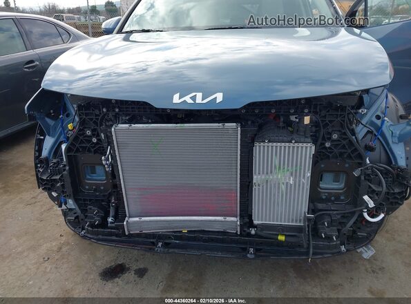 KNDPVDDG1T7309826 2026 KIA SPORTAGE HYBRID Синий Вид спереди