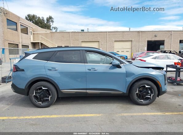 KNDPVDDG6T7285295 2026 KIA SPORTAGE HYBRID Light Blue Вид задней части салона